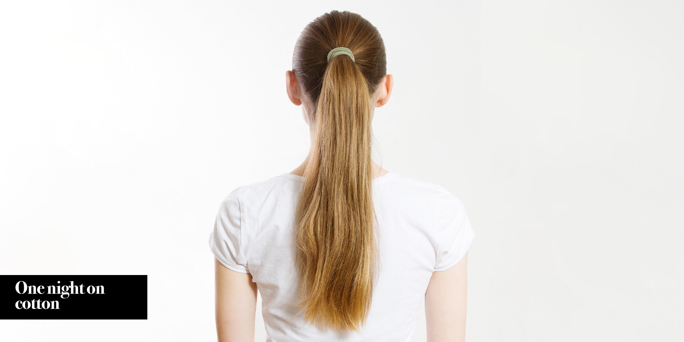 Girl with frizzy hair before sleeping on a silk pillowcase.